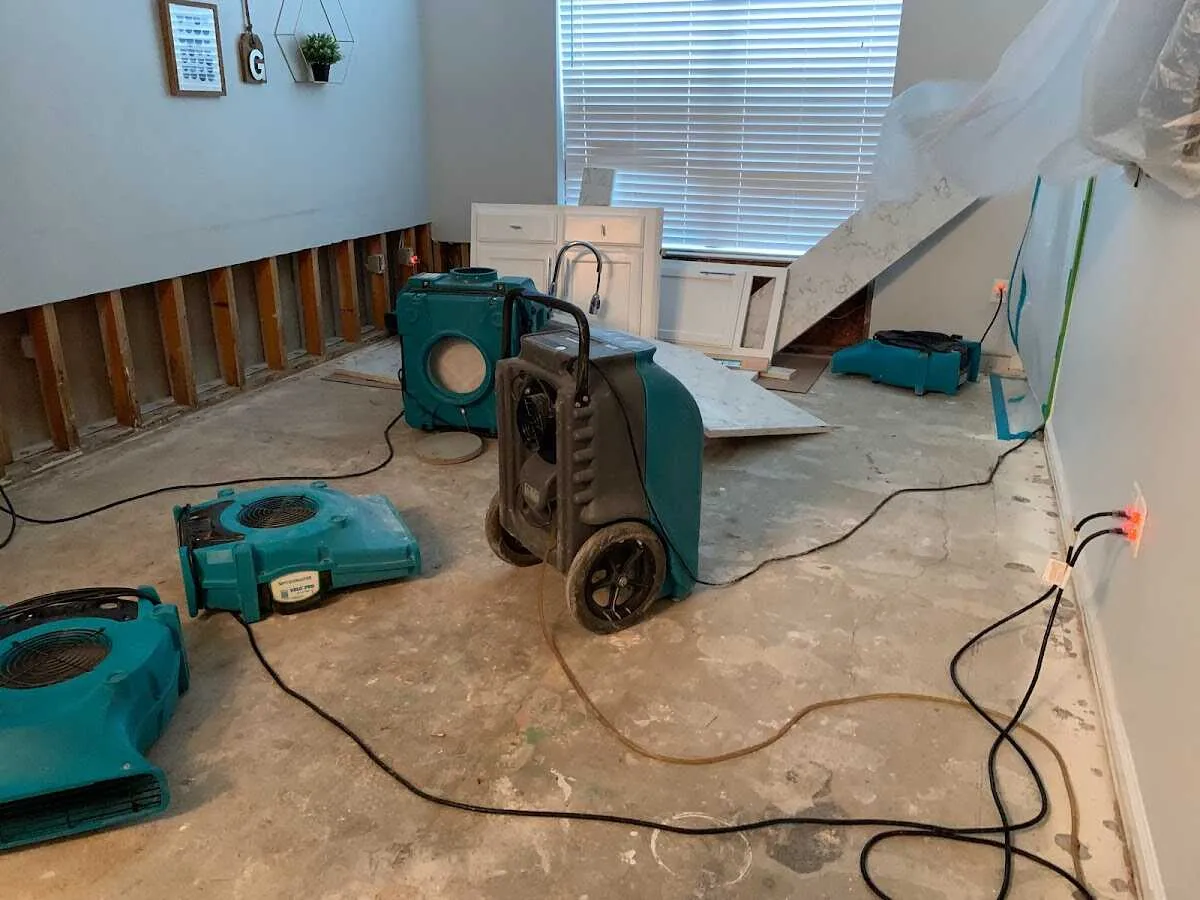 Dehumidifier in flood-cut room for Water Damage Restoration in Airway Heights